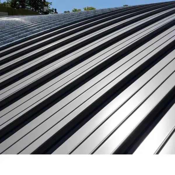 Close-up of a modern metal roof with sleek, reflective panels.